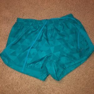 Turquoise nike athletic shorts